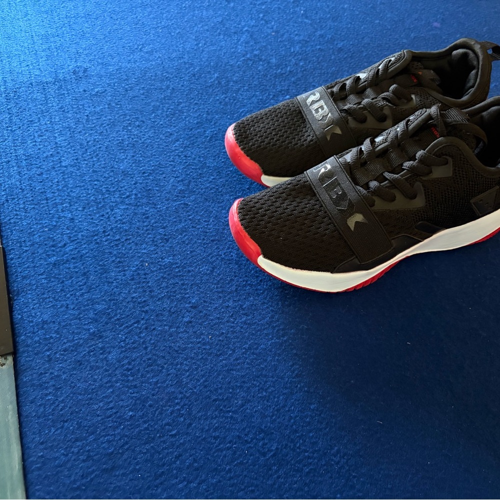Converse Black Sneaker with Red Logo Detail
